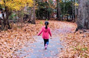 Autism: a girl running free in nature