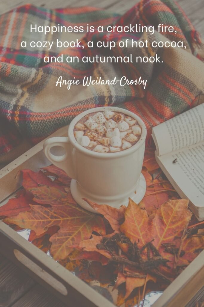 cute fall quote with an autumn pic of hot cocoa, fall leaves, and a book | Photo by Alisa Anton